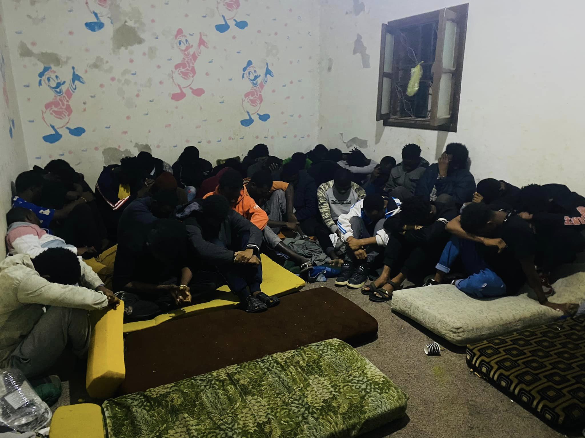 Zuwara Security Directorate raids a house used by a group of human smugglers to detain migrants.
