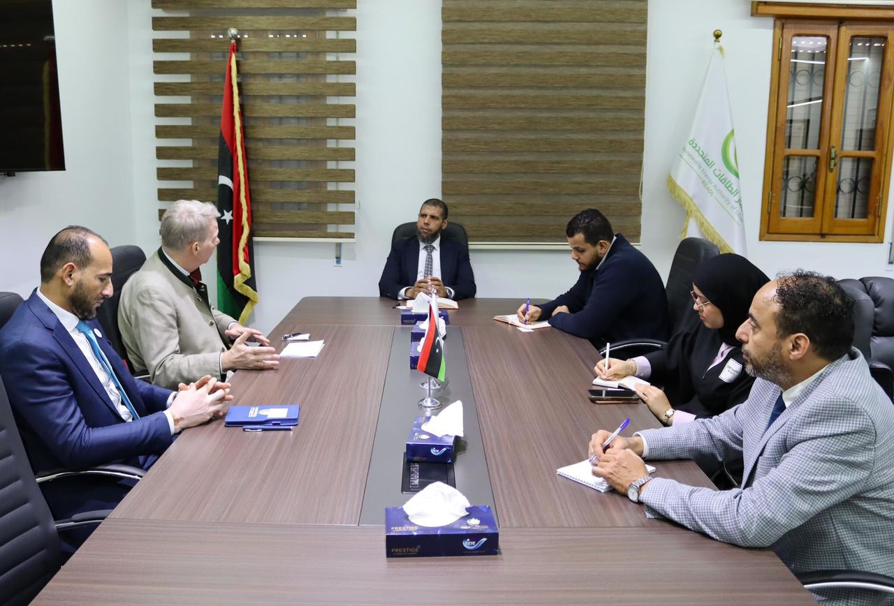 Discussing cooperation between Libya and Germany in implementing renewable energy projects.