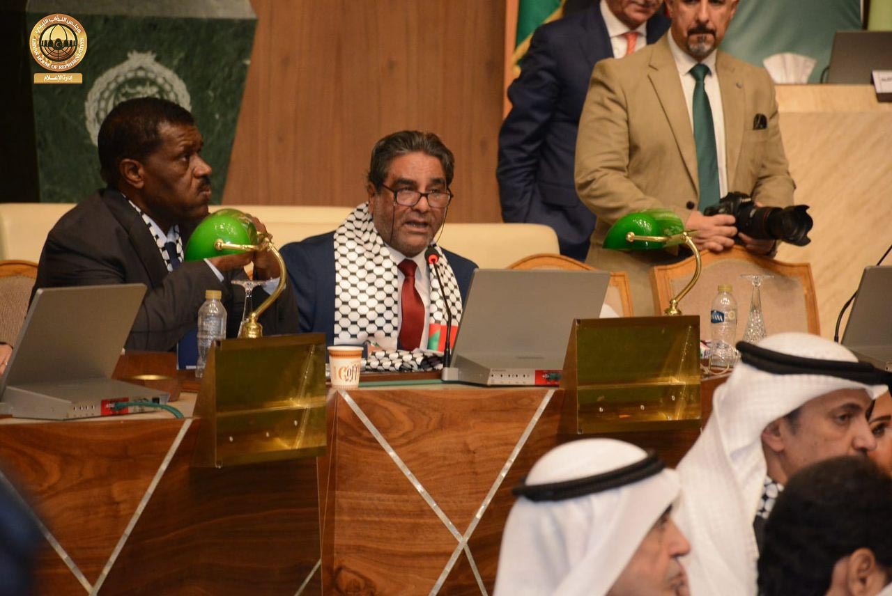 Members of the Libyan House of Representatives participate in the third plenary session of the Arab Parliament in Cairo