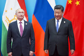 رئيسا الصين ورسيا يدينان الولايات المتحدة ويتعهدان بتوثيق علاقاتهما .