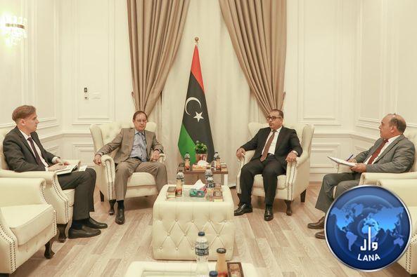 Discussing ways to develop Libyan-Russian relations.